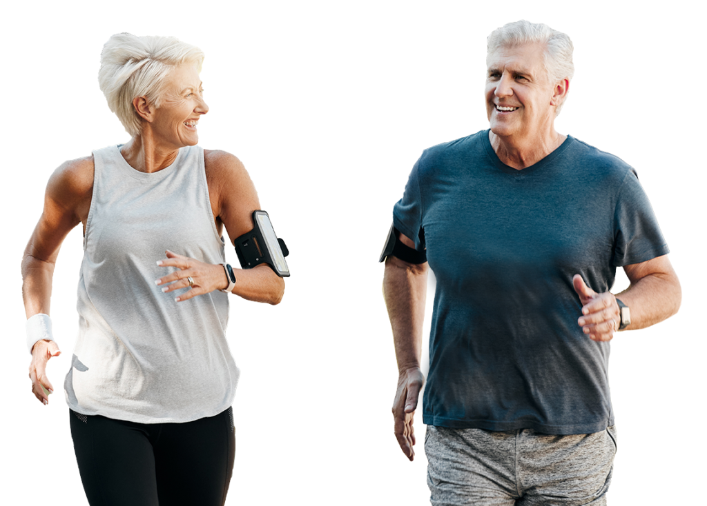 happy senior couple jogging